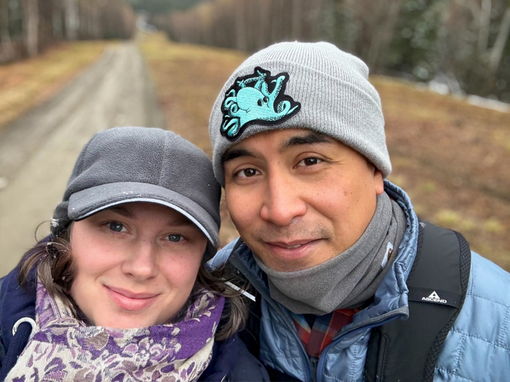 Carlos and Mary Garcia bundled up for a winter walk on a country road near Fairbanks, Alaska.