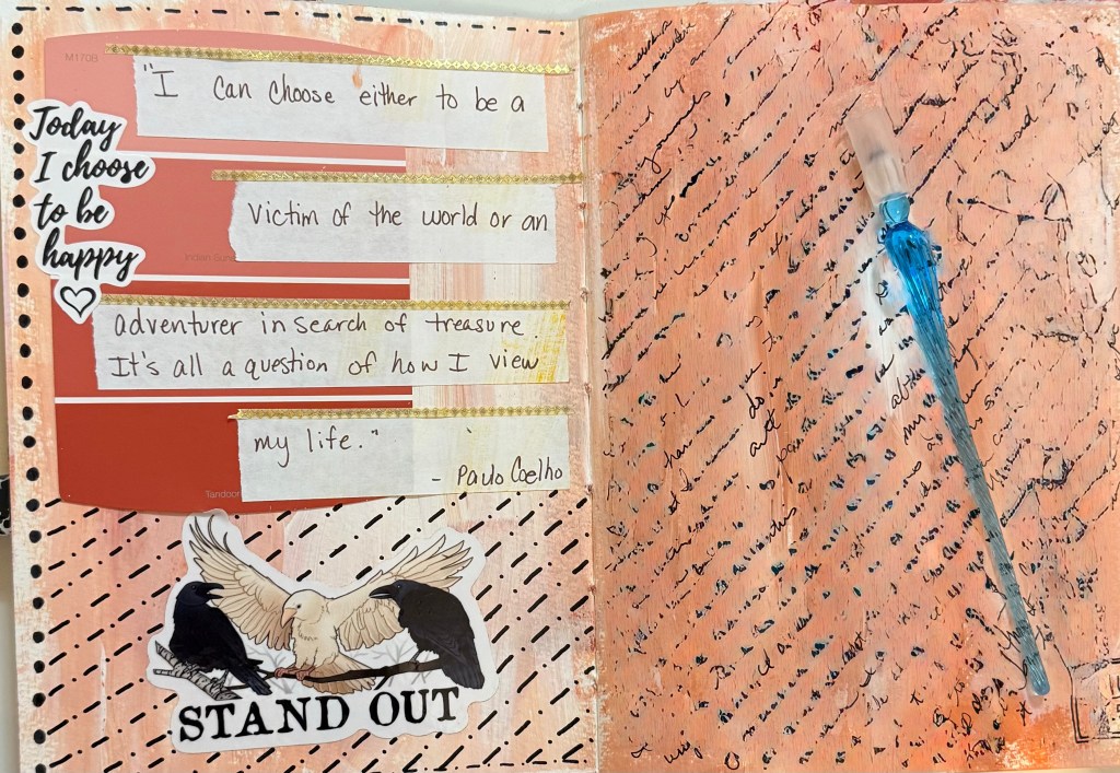 A peach-colored art journal spread with handwritten notes, soft background color, and ink written with a glass dip pen.